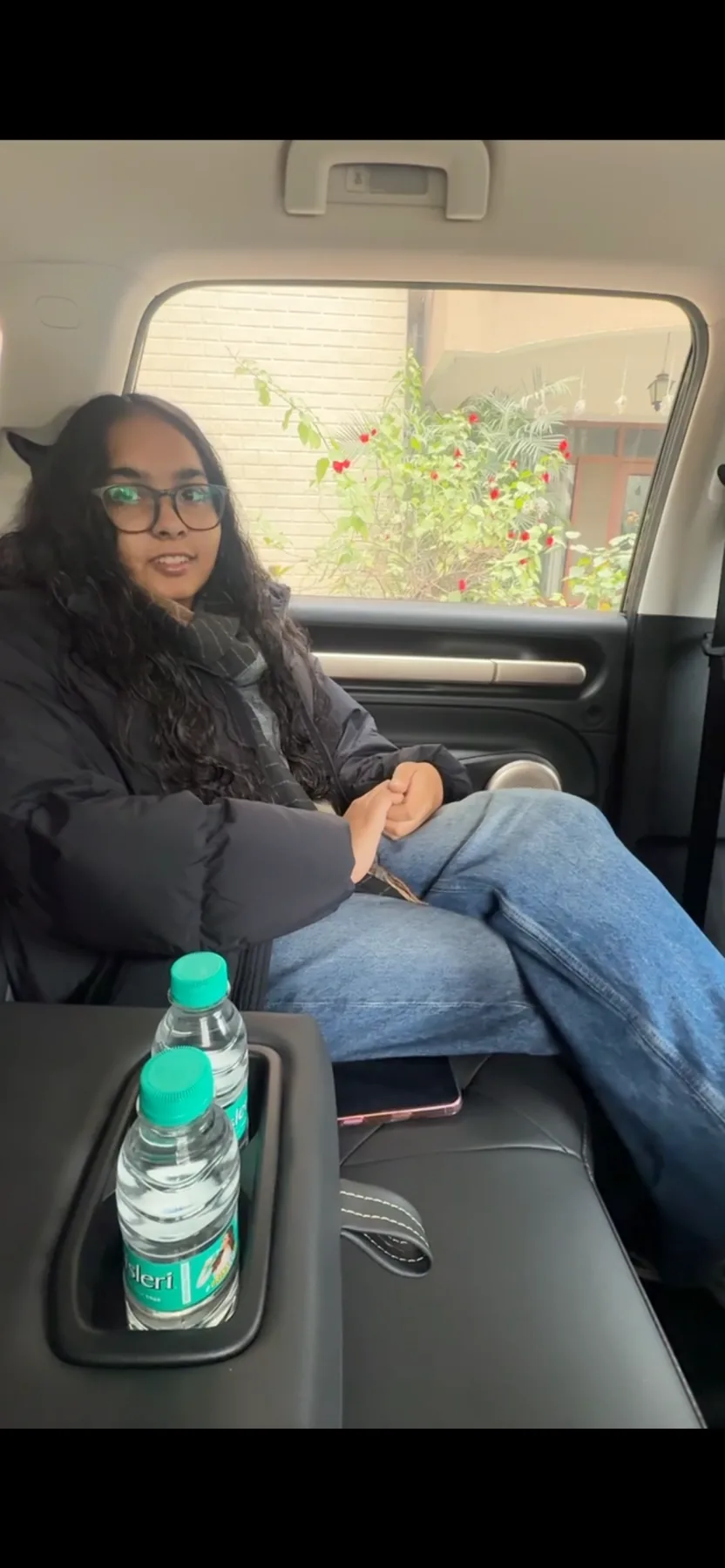 Myra sitting comfortably in a Trevel cab