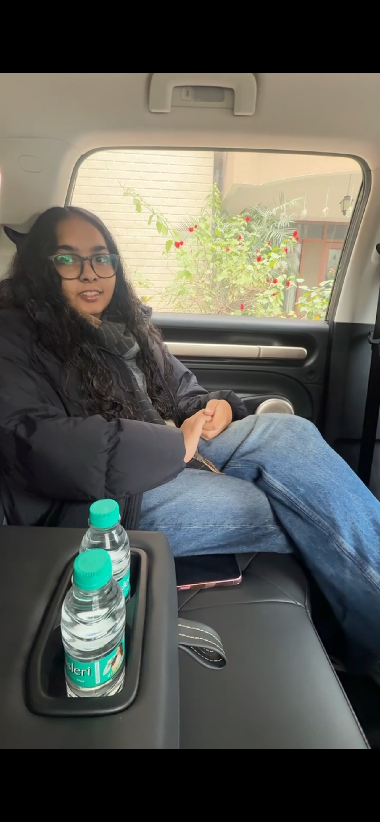 Myra sitting comfortably in a Trevel cab
